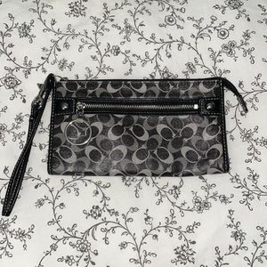 Coach coated signature zip wallet wristlet.